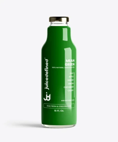 A vibrant bottle of Mean Green fresh juice with kale and celery, from JuiceDefined in Miami