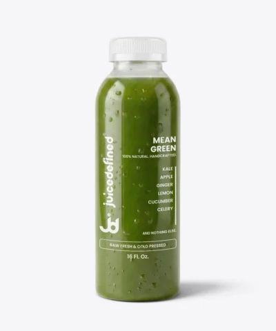 A vibrant bottle of Mean Green fresh juice with kale and celery, from JuiceDefined in Miami